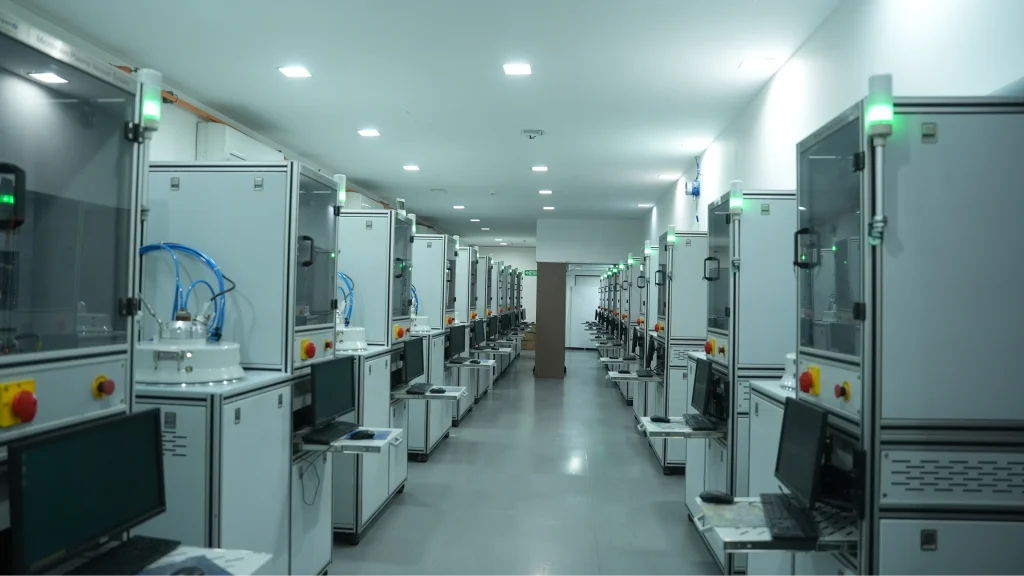 Manufacturing facility with multiple automated processing chambers in controlled environment